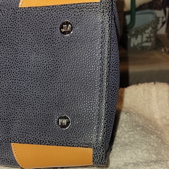 Black and Tan Satchel with Structured Shape and Sturdy Material - Picture 11 of 12